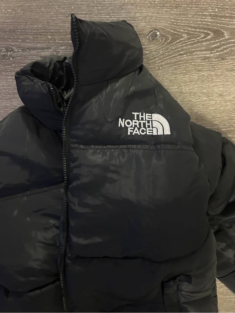 The North Face Black Puffer Jacket with White Logo